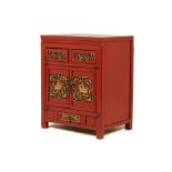 A CHINESE RED LACQUERED CABINET