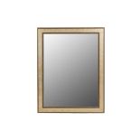 A LARGE FRAMED WALL MIRROR