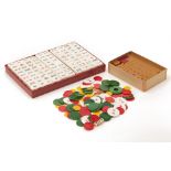 TWO SETS OF MAHJONG TILES AND A BAG OF CHIPS