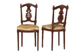 A PAIR OF UPHOLSTERED SIDE CHAIRS