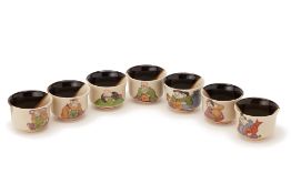A SET OF SEVEN SAKE OR WINE CUPS