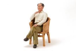 A SEATED MAO PROPAGANDA PORCELAIN FIGURE