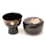 A BLACK LACQUER CIRCULAR BOX AND A FOOTED BOWL