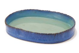 A JAPANESE STUDIO POTTERY OVAL BLUE GLAZED DISH