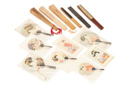 A GROUP OF FAN DESIGN GREETING CARDS AND HANDHELD FANS