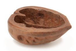 A CARVED WOOD BOWL IN THE FORM OF A WALNUT SHELL