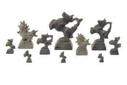 A GROUP OF TEN BRONZE OPIUM WEIGHTS