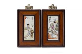 A PAIR OF CHINESE FAMILLE ROSE PORCELAIN PLAQUES