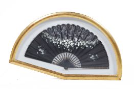 A FRAMED VINTAGE LACE FAN