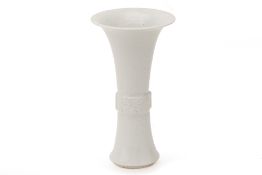 A BLANC DE CHINE PORCELAIN GU-SHAPED BEAKER VASE