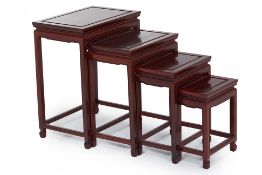 A NEST OF FOUR CHINESE ROSEWOOD TABLES