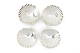 FOUR SILVER AND SILVER PLATED SHELL SALTS