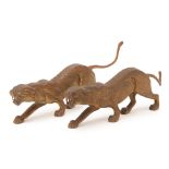 A PAIR OF CAST METAL MODELS OF PANTHERS