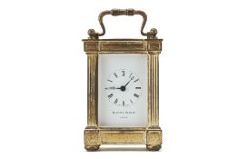 A MATTHEW NORMAN BRASS CARRIAGE CLOCK