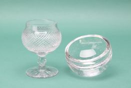 A CUT GLASS GOBLET AND A GLASS BOWL