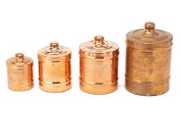 A SET OF FOUR GRADUATED COPPER CANISTERS