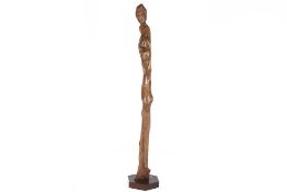 A TALL ROOTWOOD FIGURAL SCULPTURE