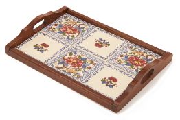 A TWIN HANDLED TILED WOOD TRAY