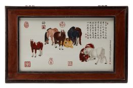 A CHINESE PORCELAIN PLAQUE OF HORSES