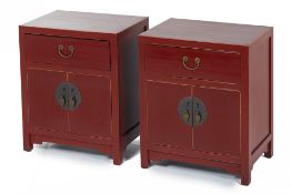 A PAIR OF RED LACQUER BEDSIDE CABINETS