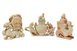 THREE ORIENTAL CARVED HARDSTONE/JADE COVERED VESSELS