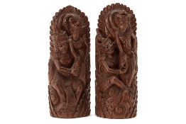 A PAIR OF INDONESIAN WOOD CARVINGS