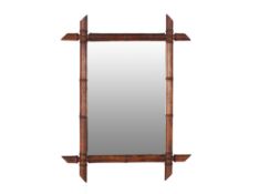 A VINTAGE FRENCH OAK FRAMED MIRROR