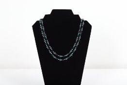 AN ONYX, HEMATITE & TURQUOISE-COLOURED BEADED NECKLACE