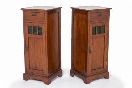 A PAIR OF TALL GLASS PANELLED SIDE CABINETS