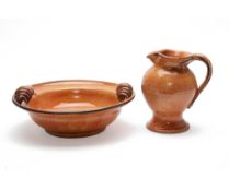 A MOTTLED BURNT ORANGE GLAZED ITALIAN BOWL AND PITCHER