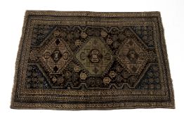 A MIDDLE EASTERN WOOL RUG
