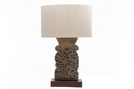 A BALINESE CARVED TABLE LAMP