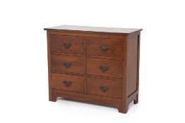 A TEAK CHEST OF DRAWERS