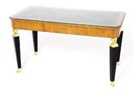 A LEATHER INSET WRITING TABLE