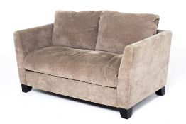 A VELOUR OYSTER GREY UPHOLSTERED TWO SEATER SOFA