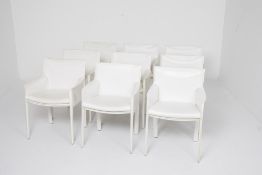 A SET OF TEN ENRICO PEILLIZZONI WHITE LEATHER ARMCHAIRS