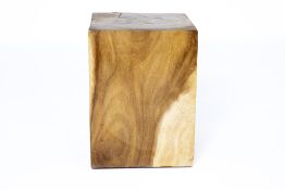 A WOODEN BLOCK STOOL