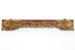 A CARVED GILTWOOD CHINESE BED FRONT
