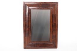 A MAHOGANY CUSHION FRAME MIRROR