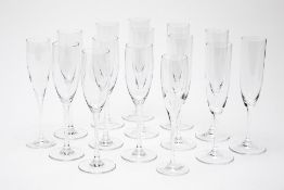 A SET OF RIEDEL AND OTHER CHAMPAGNE FLUTES