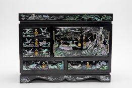 A KOREAN BLACK LACQUERED SMALL CABINET