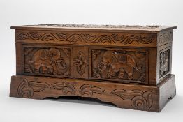 A CARVED WOODEN VANITY CHEST