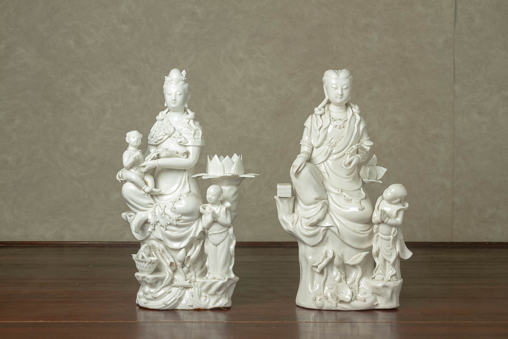 TWO BLANC DE CHINE PORCELAIN FIGURES OF GUANYIN