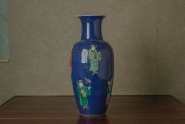 A POWDER BLUE GROUND FAMILLE VERTE BALUSTER VASE