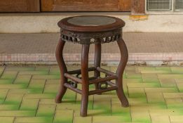 A MARBLE INLAID CARVED HARDWOOD STOOL