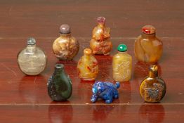 A COLLECTION OF NINE HARDSTONE SNUFF BOTTLES