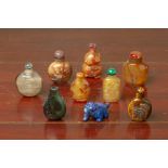 A COLLECTION OF NINE HARDSTONE SNUFF BOTTLES