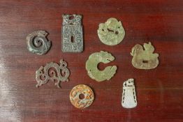 EIGHT ARCHAIC STYLE JADE PENDANTS AND CARVINGS