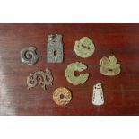 EIGHT ARCHAIC STYLE JADE PENDANTS AND CARVINGS