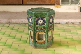 A GREEN GLAZED HEXAGONAL JARDINERE STAND